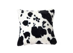 Coussin carré 45x45 cm en tissu poils effet peau de vache noir et blanc SAKINA
