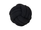 Coussin rond décoratif boule de nœud en effet peau de mouton noir NODUS