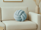 Coussin rond décoratif boule de nœud en effet peau de mouton bleu NODUS